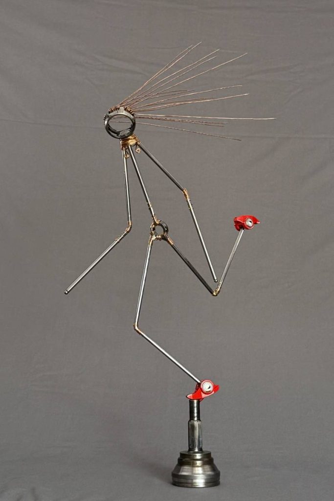 Red Shoes — a trophy welded from reclaimed automotive parts